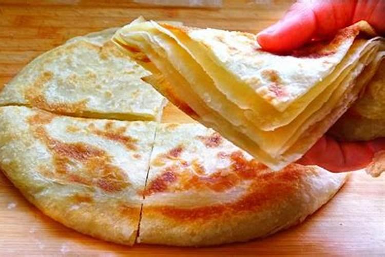 腊月二十三家家烙饼的原因是？